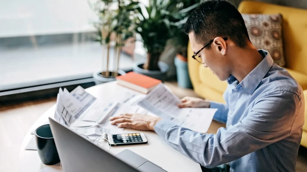 I’m 22 with $204,000 saved after paying off my car. Should I redirect that freed-up cash flow into my business or keep building personal wealth?